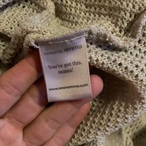 Cocoon by Amma.  Beautiful condition, no rips, stains, tears.